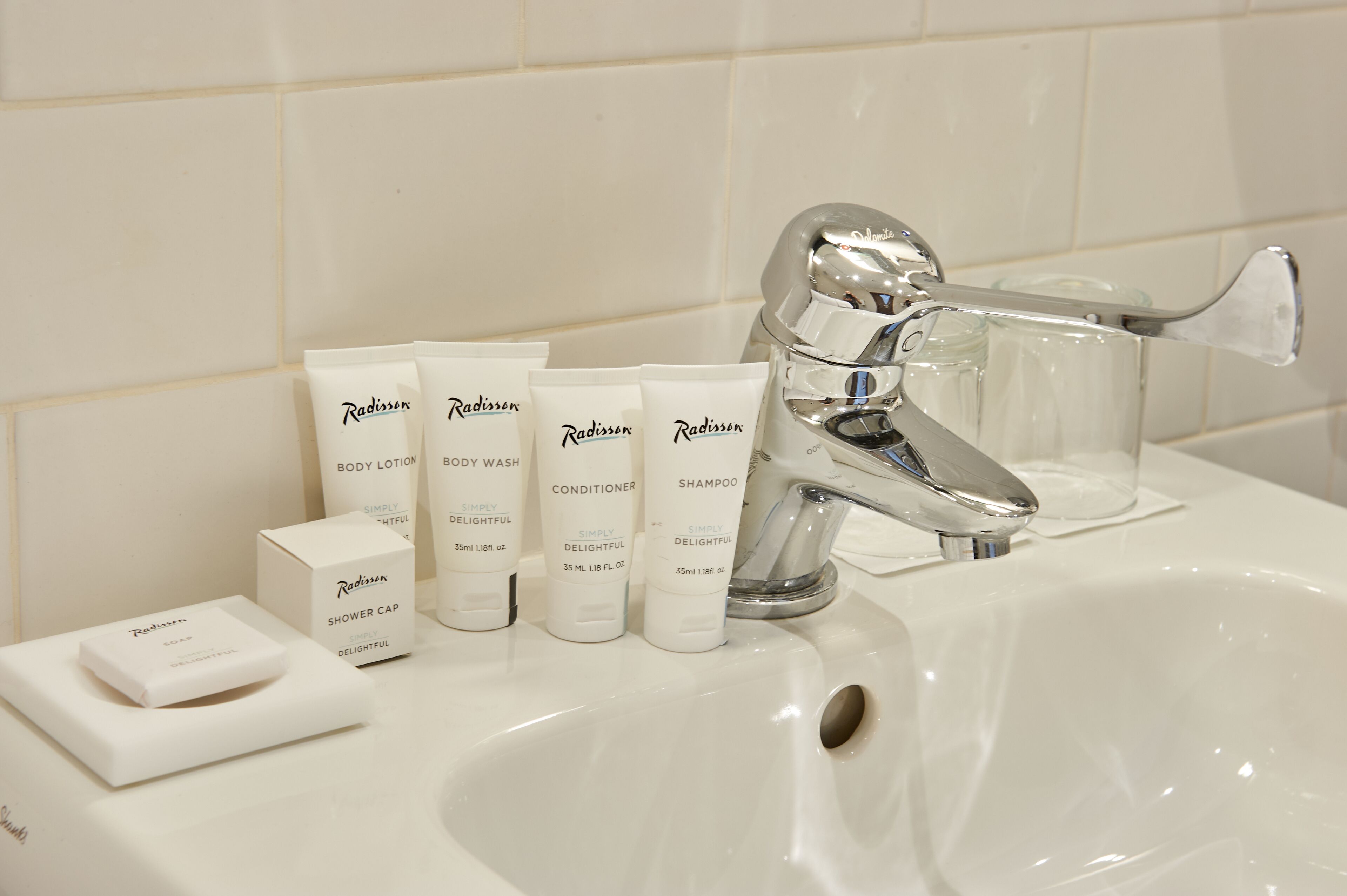 Deep-soaking bathtub, rainfall showerhead, free toiletries, hair dryer