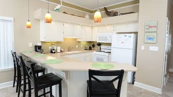 Coffee/tea maker, fridge, microwave, oven