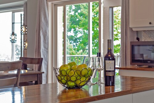 Luxueuse suite avec vue olympique 1400 pieds carrés + balcon