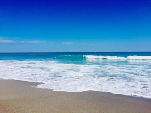 On the beach, sun loungers, beach towels