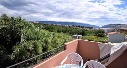 Holiday apartment with balcony and air conditioning