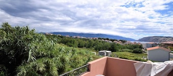 Holiday apartment with balcony and air conditioning