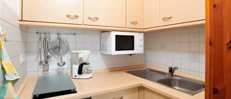 Fridge, microwave, dining tables