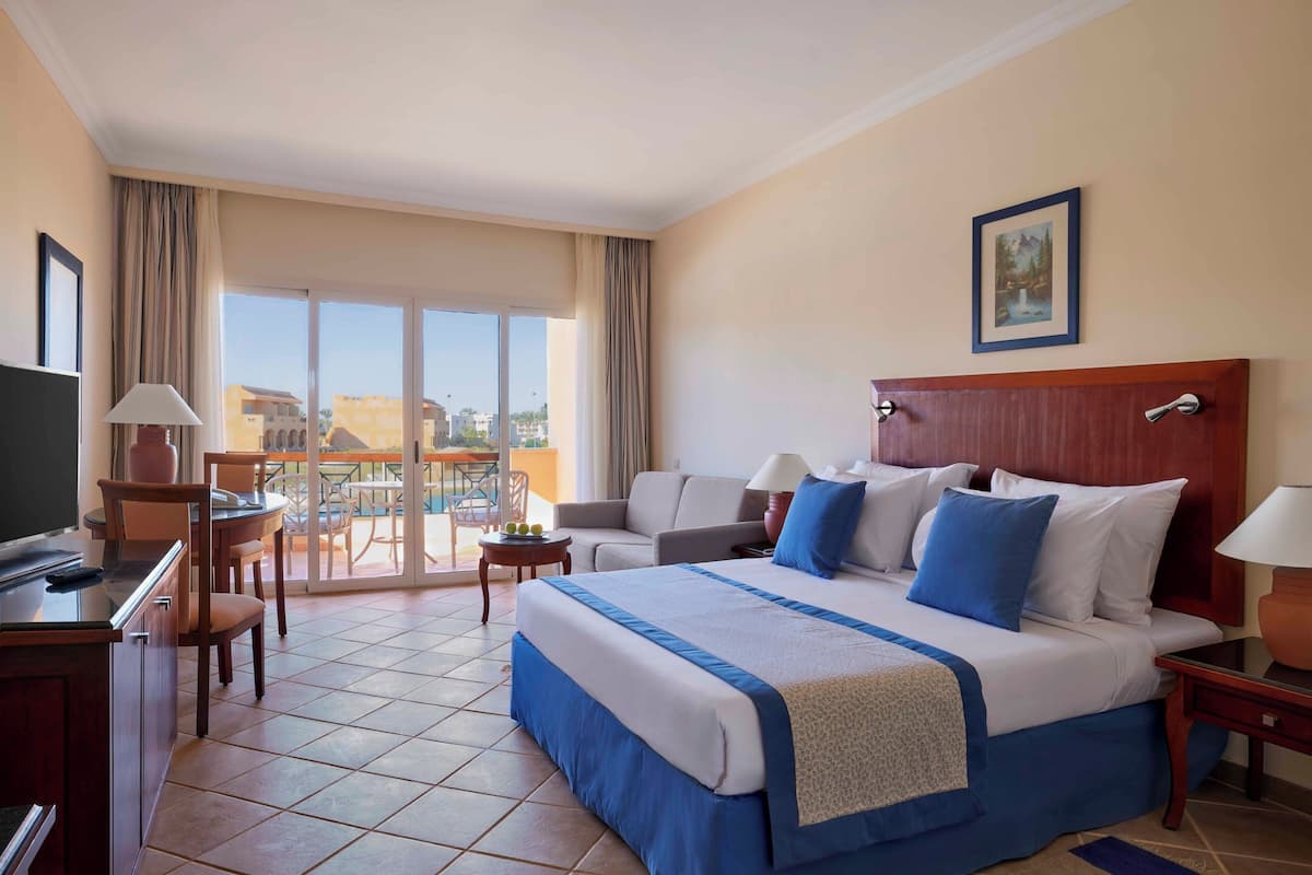 Superior Room, Pool View (Premium, Queen or Twin Bed) | Minibar, in-room safe, individually decorated, desk