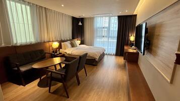 Super Deluxe | Premium bedding, down comforters, desk, laptop workspace