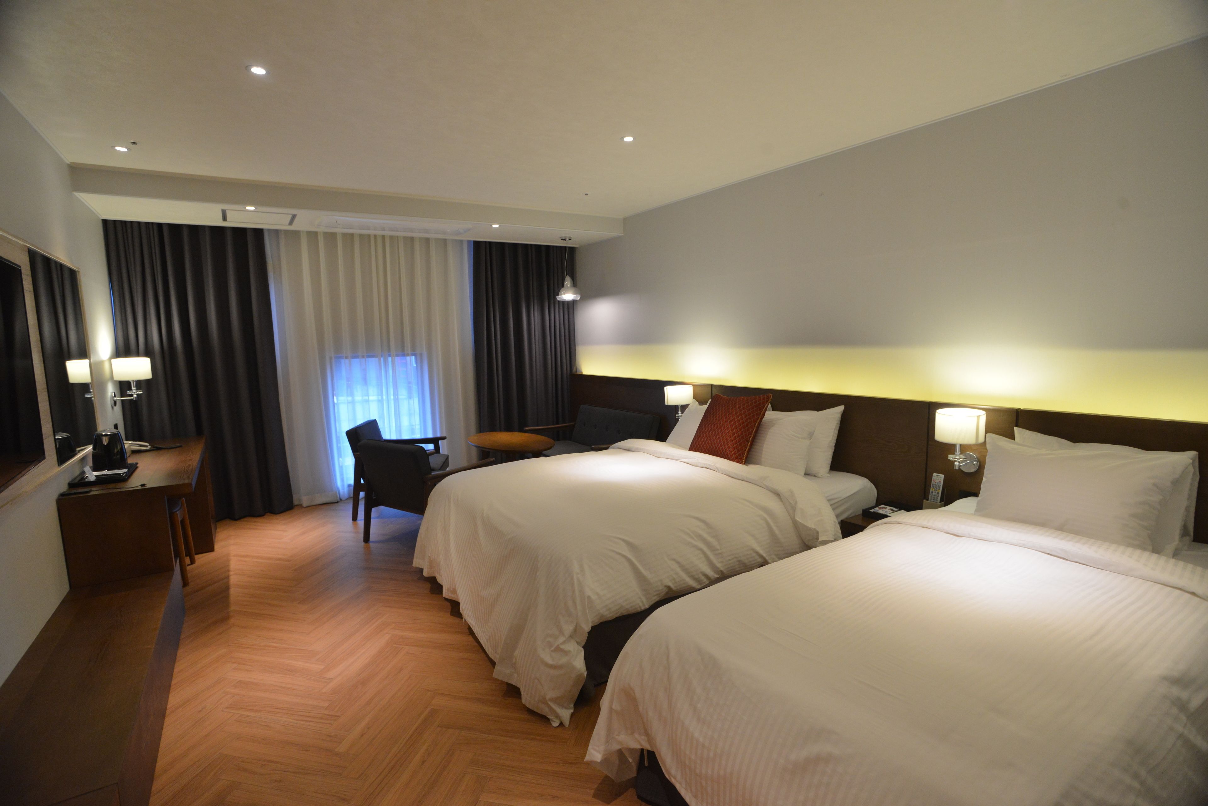 family twin room | premium bedding, down duvets, desk, laptop workspace