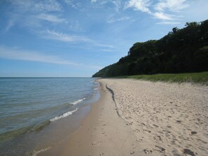 On the beach, sun-loungers