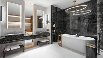 Separate tub and shower, free toiletries, hair dryer, bathrobes