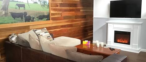 Deluxe Studio Suite, 1 Queen Bed | Living area | TV