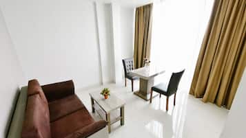 Junior Suite | Living area | LED TV