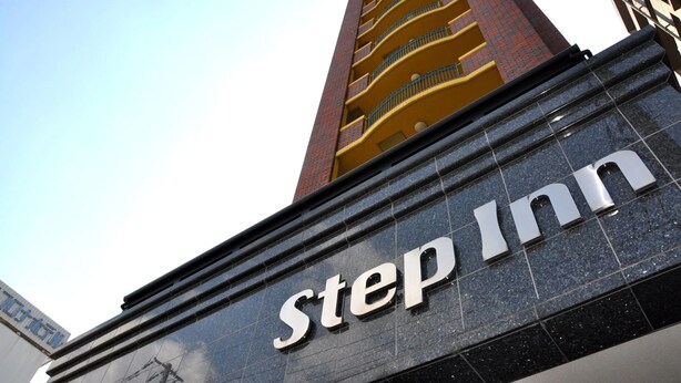 A hotel sign with the name "Step Inn" on a building facade. - Step Inn Shin-Osaka Higashiguchi (Osaka)