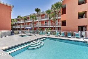A swimming pool with a blue border, surrounded by a white fence and palm trees. - 👣Steps to Private Beach Access-Pool + Hot Tub-1BR Gulfview II 318🌊️ (Miramar Beach)
