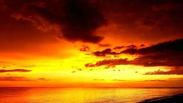 On the beach, sun loungers, beach towels