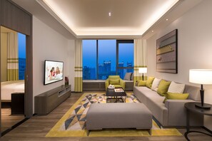Deluxe Room, 2 Bedrooms | Living room