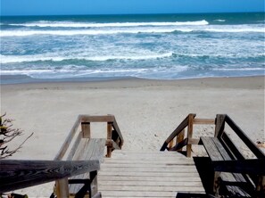 On the beach, sun loungers, beach umbrellas, beach towels