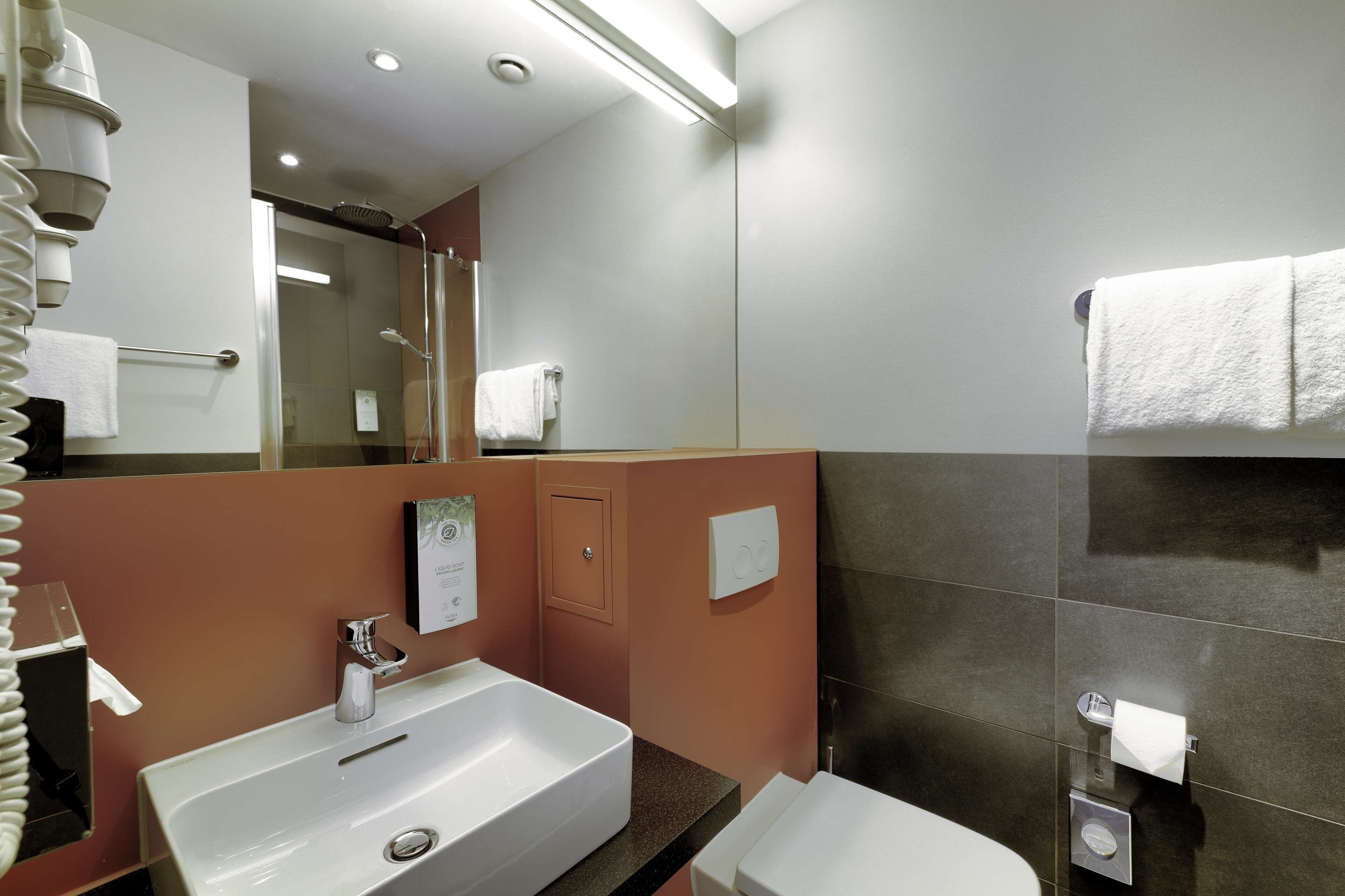 shower, eco-friendly toiletries, hair dryer, towels