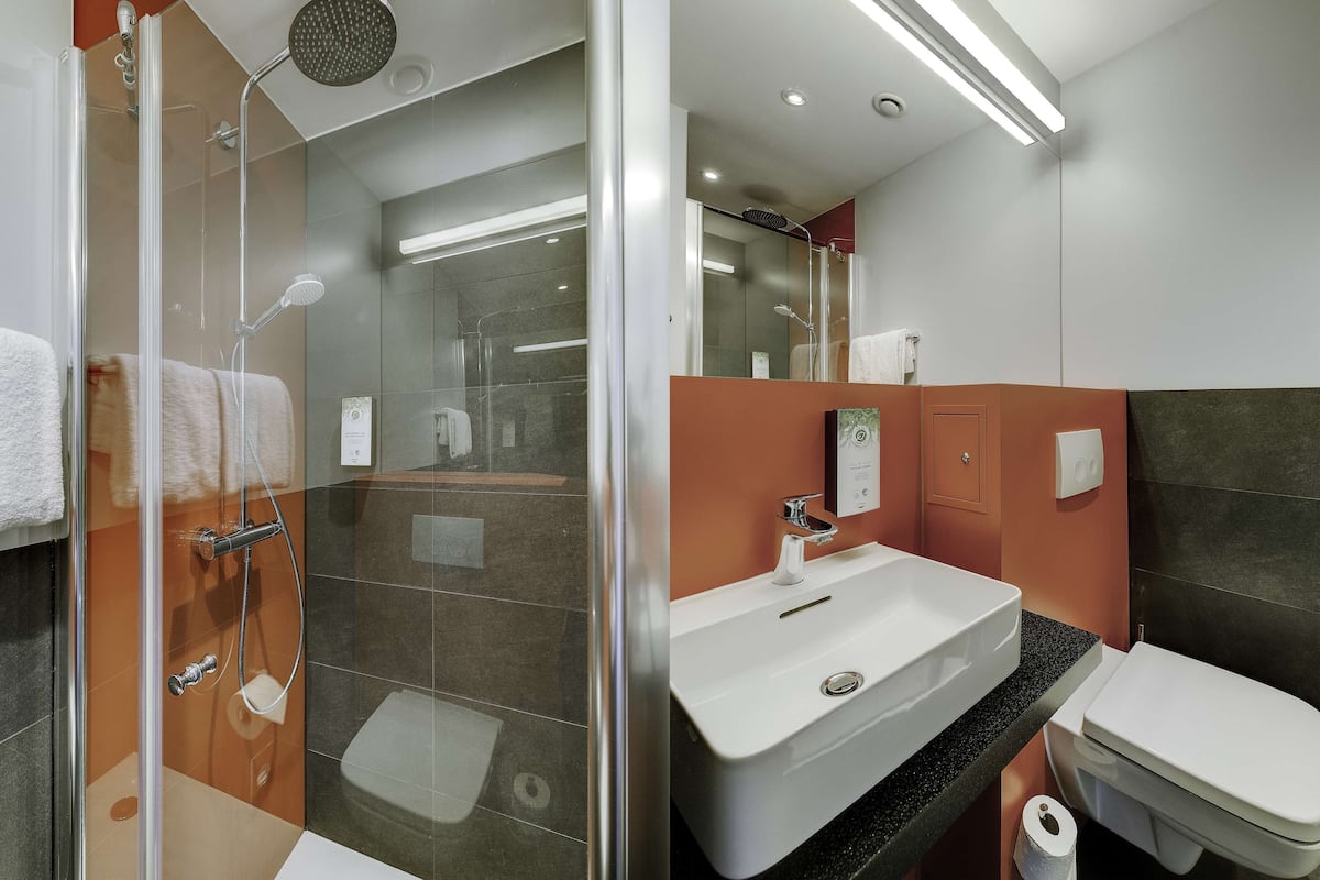 shower, eco-friendly toiletries, hair dryer, towels