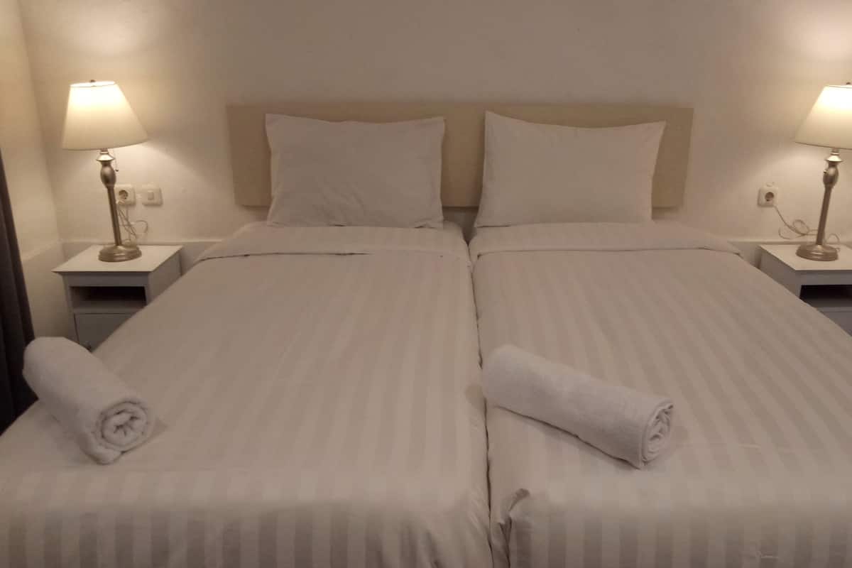 Twin Room Pool View | 5 bedrooms, in-room safe, desk, laptop workspace