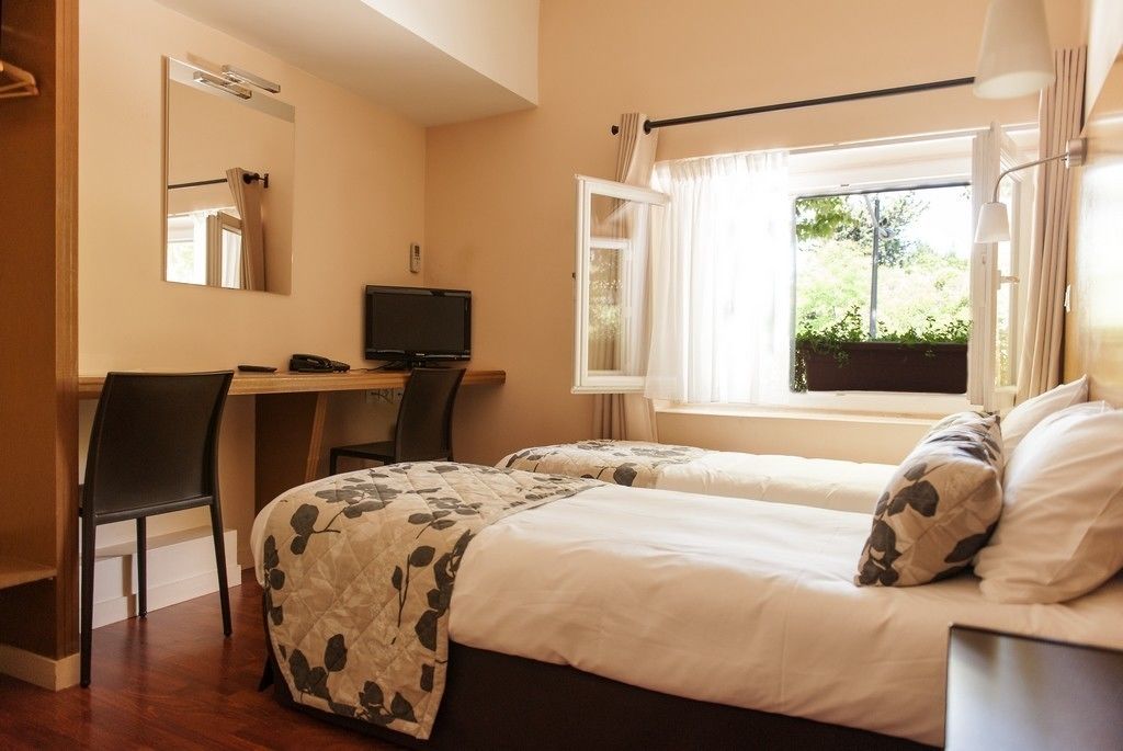 twin room | premium bedding, desk, soundproofing, iron/ironing board