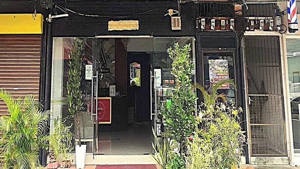 A hotel entrance with a sign reading "Hotel Penang" and a phone number. - F Hotel Bayan Lepas (George Town)