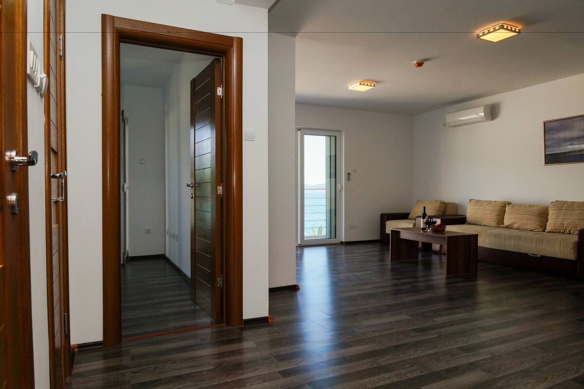 Habitación familiar, 2 habitaciones, frente al mar | 1 habitación, caja de seguridad en la habitación, cunas y wifi gratis