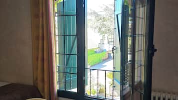 Habitación cuádruple familiar | Escritorio, cunas gratuitas, camas extra y wifi gratis