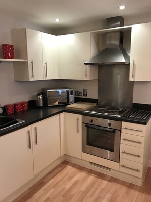 Apartment, 2 Bedrooms | Shared kitchen | Fridge, microwave, coffee/tea maker