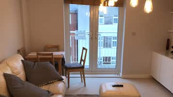 Apartment, 2 Bedrooms | Living area | Flat-screen TV