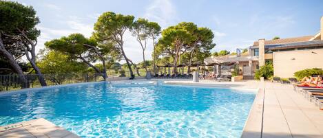 Seasonal outdoor pool, pool loungers