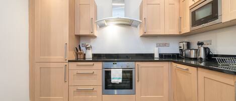 Apartment, 2 Bedrooms | Private kitchen | Full-sized fridge, microwave, oven, stovetop