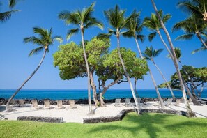 On the beach, sun loungers, beach towels