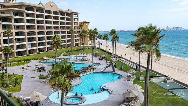 A resort with a large pool area, multiple swimming pools, and a beach view. - Sonoran Spa W403 - 2 BR Next to the Pool, High Speed Wi-Fi - Beachfront Upper Floor Luxury Condo (Puerto Peñasco)