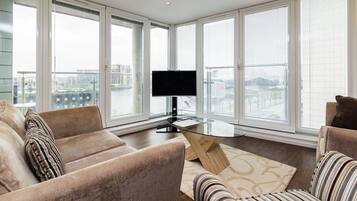 Apartment, 2 Bedrooms | Living room | Flat-screen TV