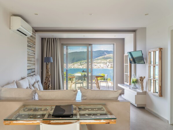 Suite, 2 Bedrooms, Sea View | Living area | Flat-screen TV, printers - Core Luxury Suites (Skiathos)