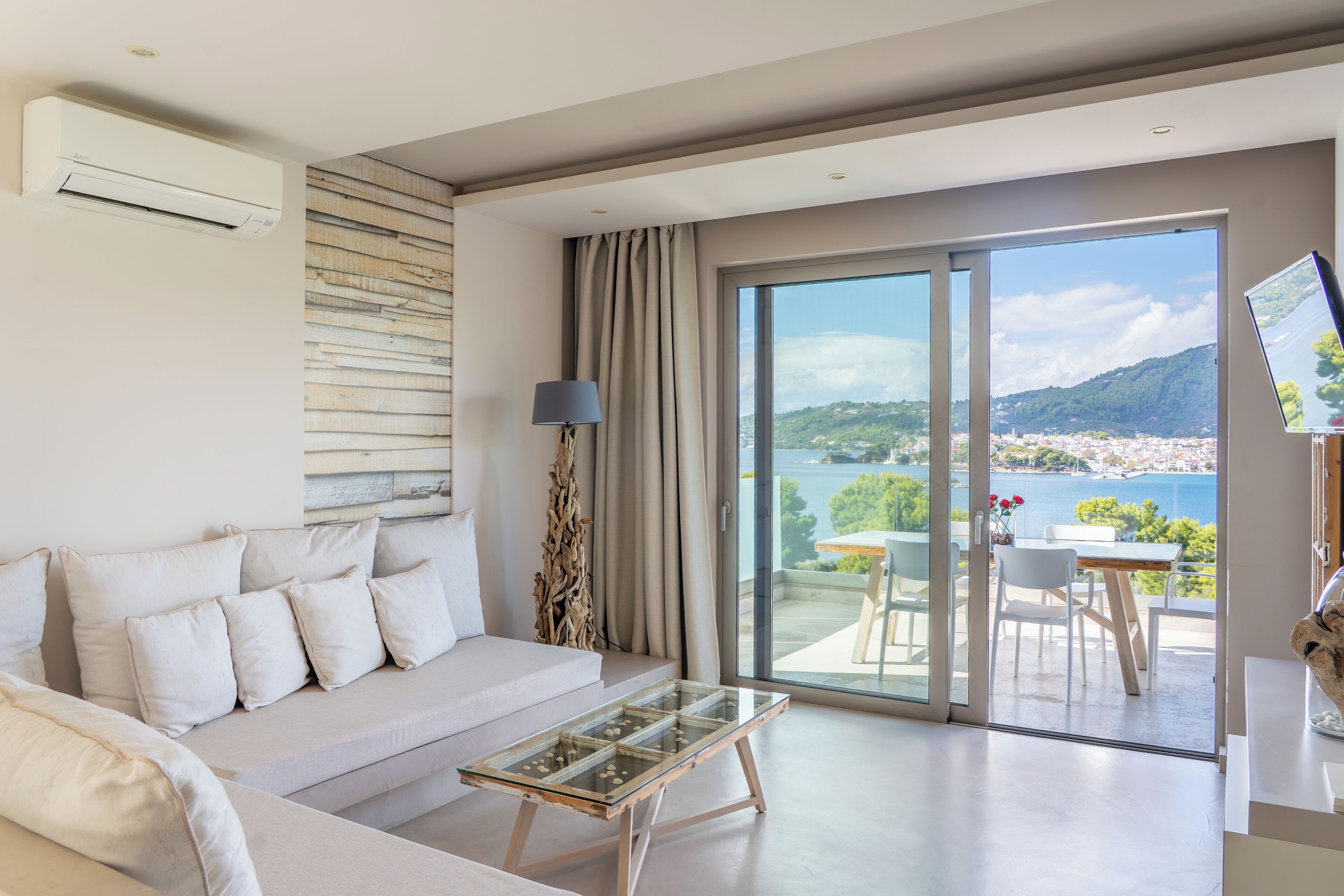 Suite, 2 Bedrooms, Sea View | Living area | Flat-screen TV, printers