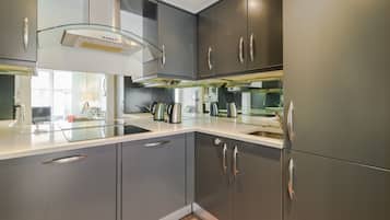 Apartment, 1 Bedroom | Private kitchen | Full-sized fridge, microwave, oven, stovetop