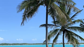 On the beach, sun-loungers, beach towels