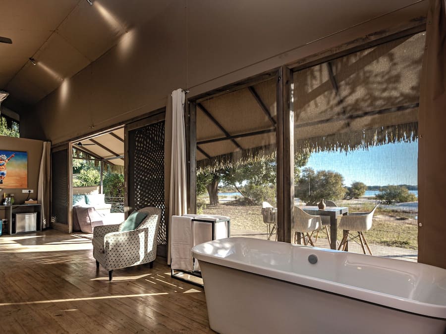 Suite, 2 Bedrooms, River View, Garden Area | Bathroom | Separate bathtub and shower, deep-soaking bathtub, free toiletries