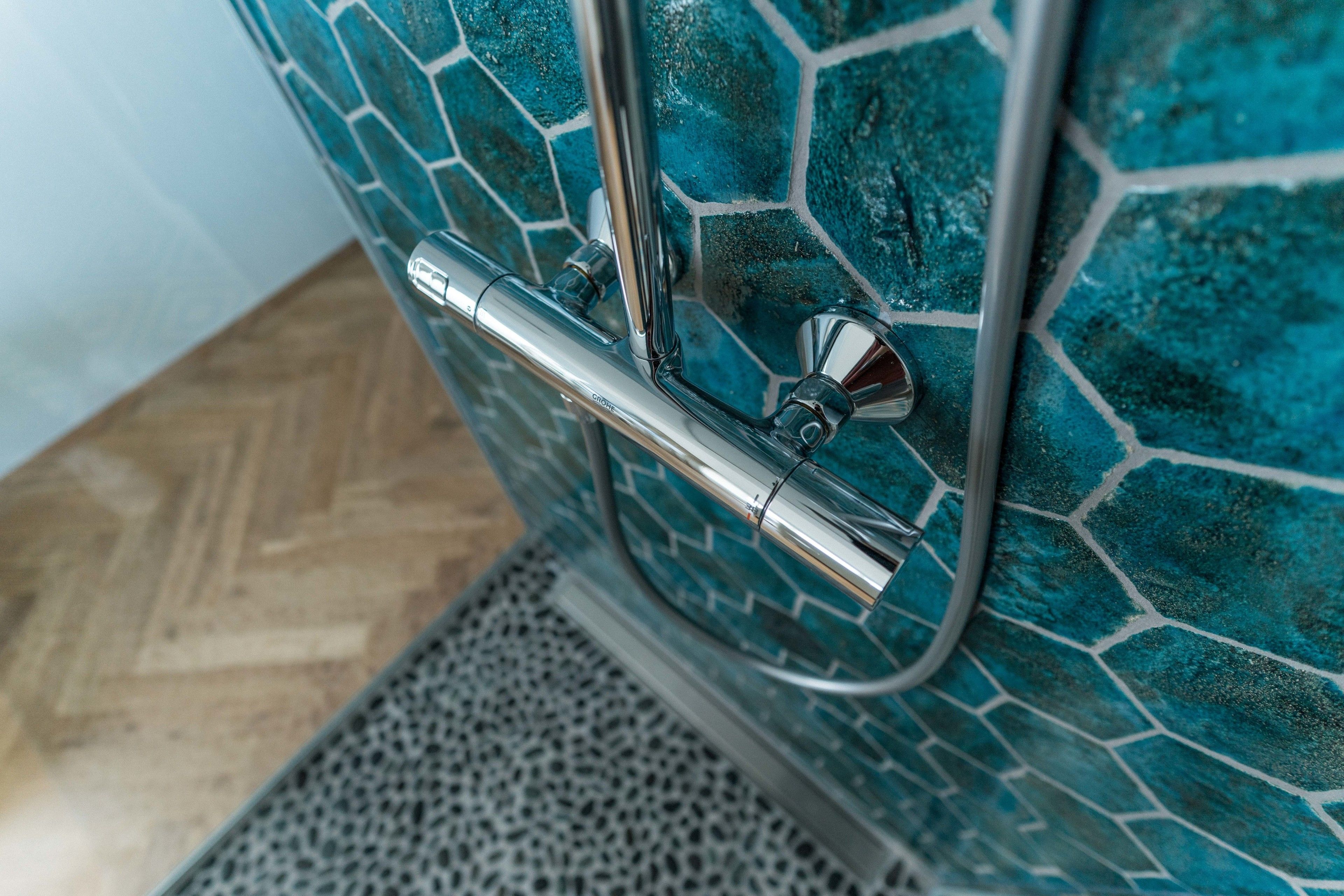 exclusive suite, 1 king bed, ocean view | bathroom | shower, designer toiletries, hair dryer, slippers