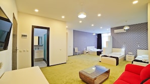 Desk, blackout curtains, soundproofing, free rollaway beds