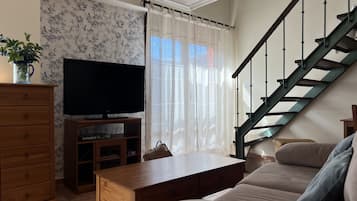 Apartamento Deluxe, baño privado, vistas a la montaña | Salón