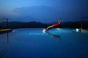 Outdoor pool, open 8 AM to 8 PM, pool umbrellas, sun loungers - Petals Resorts Wayanad (Vythiri)