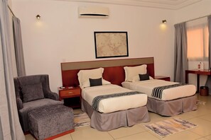 Deluxe Twin kamer, 1 slaapkamer | Luxe beddengoed, een kluis op de kamer, individueel gedecoreerd