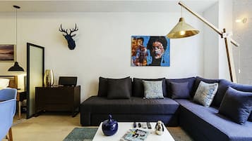 Loft design, 1 cama Queen e sofá-cama, cozinha | Área de estar | TV de tela plana