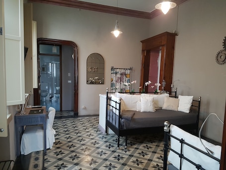 Ropa de cama de alta calidad y artículos del minibar gratis . B&B L'Ortodellerose