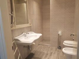 Comfort Double Room, 1 Bedroom | Bathroom | Shower, free toiletries, hair dryer, bathrobes