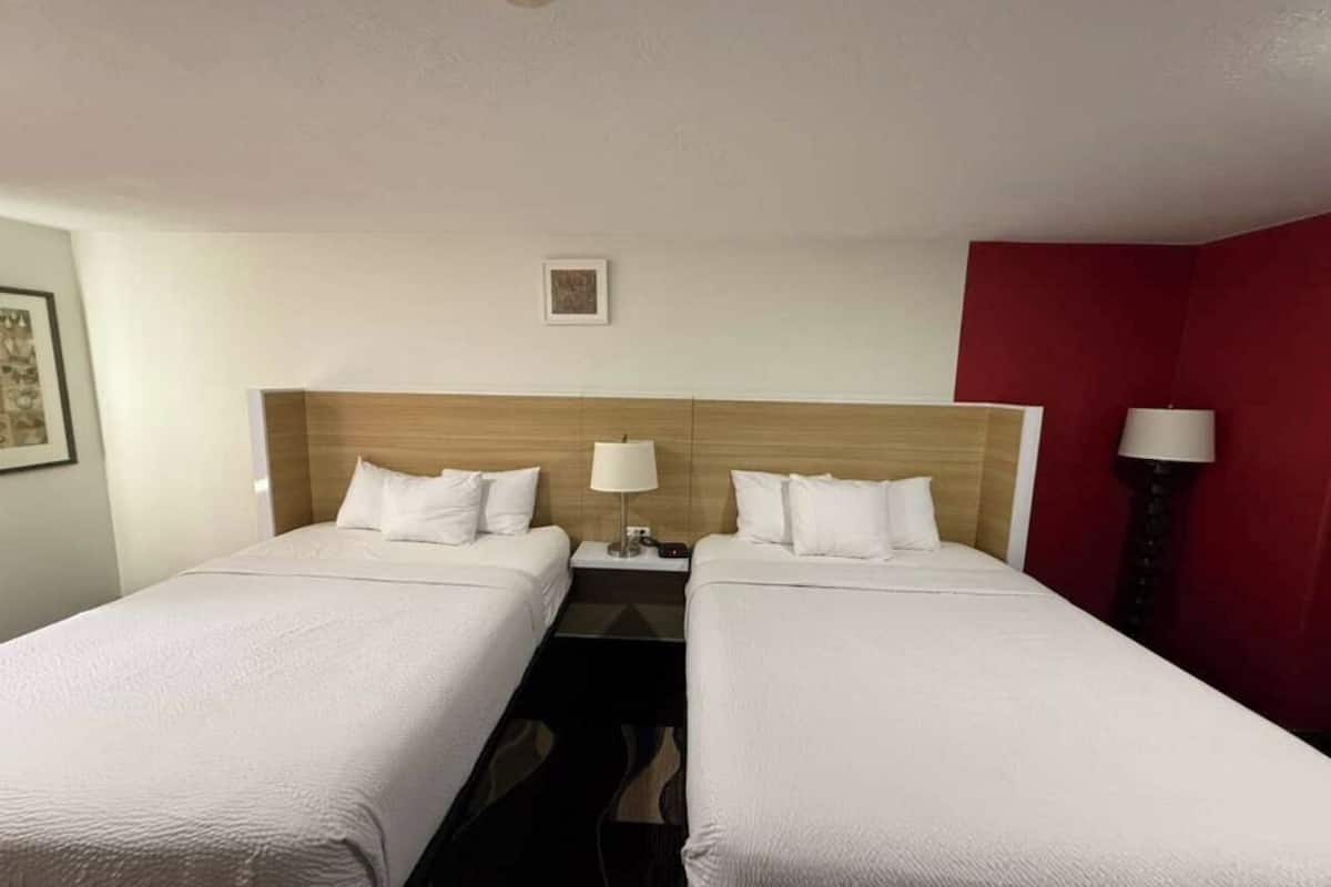 Room, 2 Queen Beds, Non Smoking | Desk, laptop workspace, iron/ironing board (on request), WiFi (free)