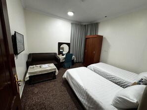 Chambre Économique avec lits jumeaux, 2 lits une place