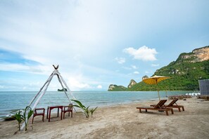 On the beach, kayaking