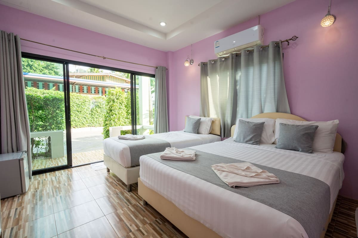 Family Room, Garden View | Minibar, blackout curtains, free cots/infant beds, rollaway beds